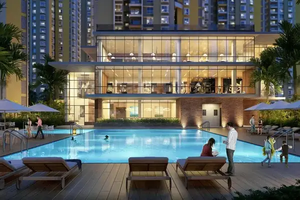 Park Titan illuminated clubhouse and pool deck in the evening